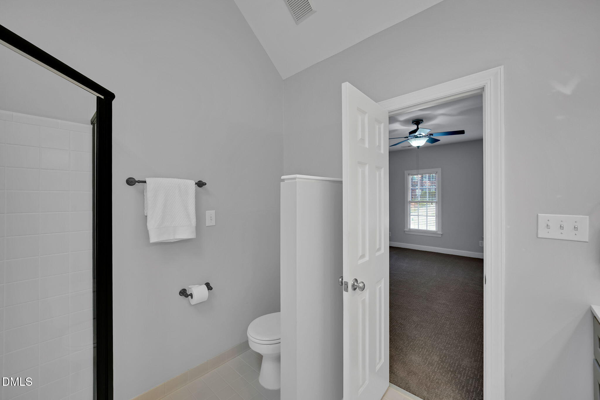 8005 Looking Glass Court Raleigh, NC 27612 - Photo 37 of 75 a bathroom with a toilet sink and shower