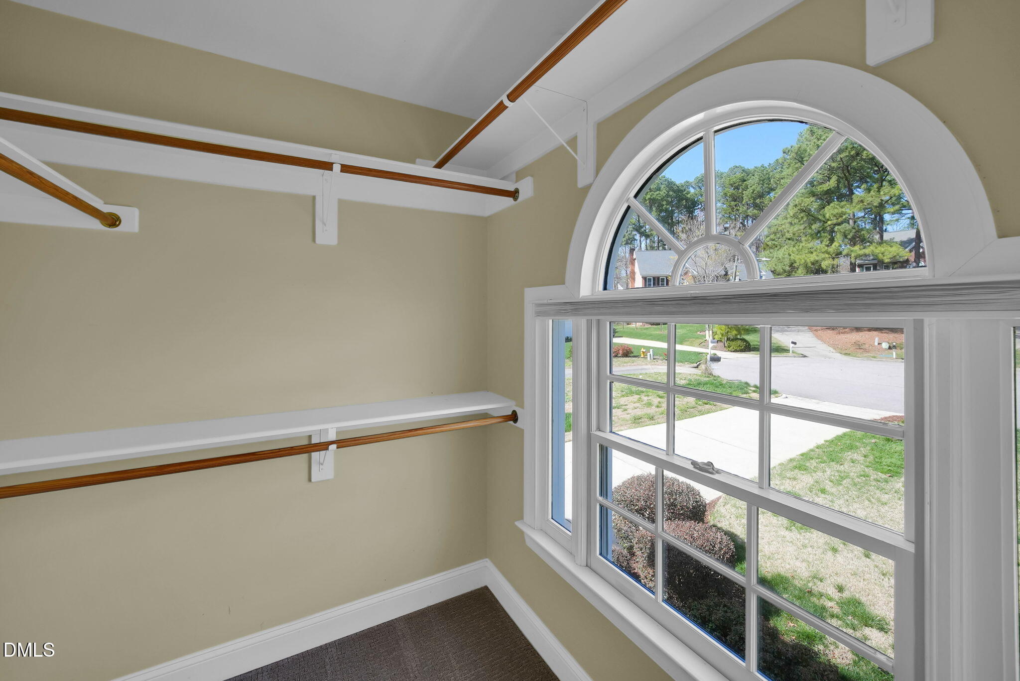 8005 Looking Glass Court Raleigh, NC 27612 - Photo 41 of 75 a view of room with window and wooden floor