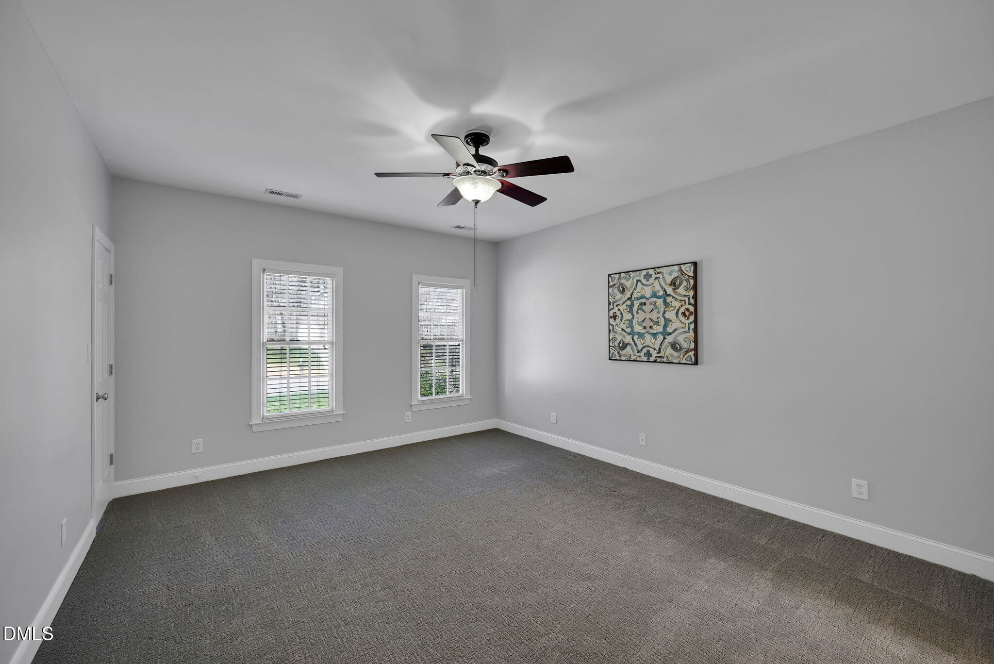 8005 Looking Glass Court Raleigh, NC 27612 - Photo 44 of 75 a view of an empty room with a window