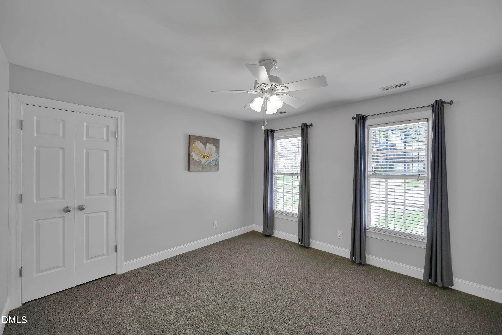 8005 Looking Glass Court Raleigh, NC 27612 - Photo 47 of 75 a view of an empty room with a window