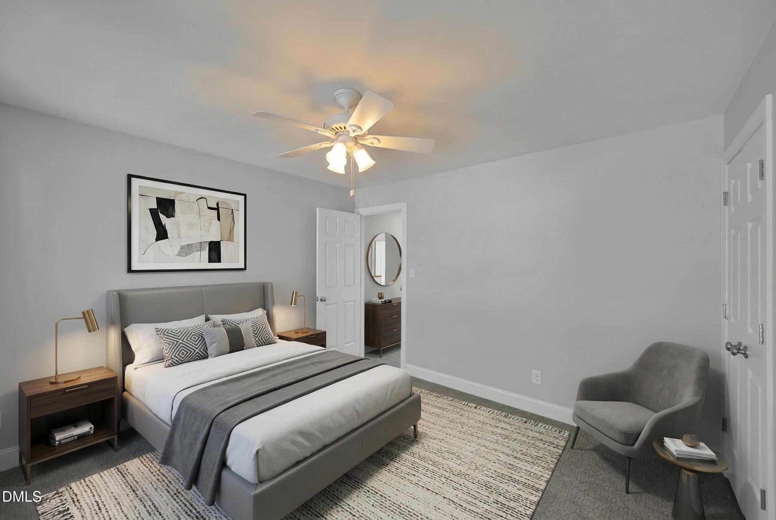 8005 Looking Glass Court Raleigh, NC 27612 - Photo 50 of 75 a bedroom with a bed and a chandelier