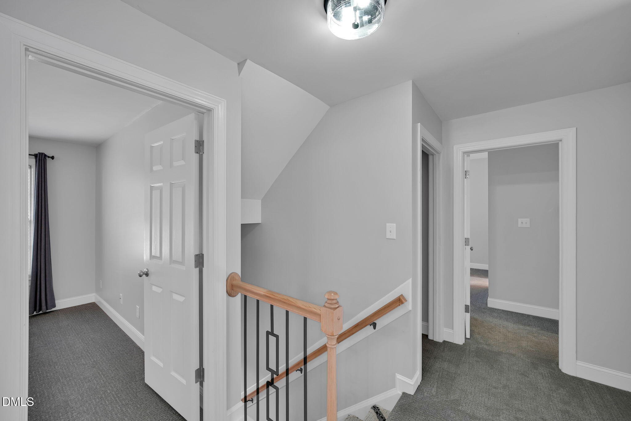 8005 Looking Glass Court Raleigh, NC 27612 - Photo 52 of 75 a view of a hallway with closet area