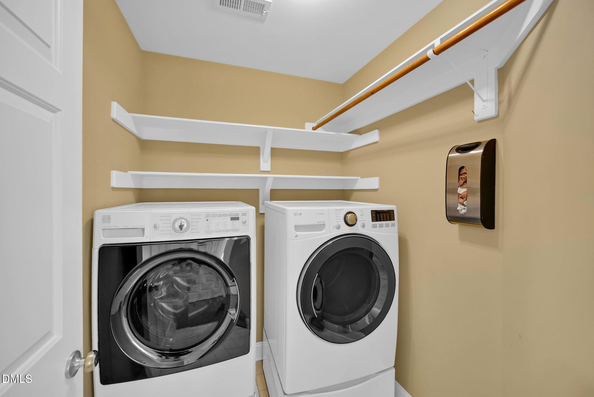 8005 Looking Glass Court Raleigh, NC 27612 - Photo 56 of 75 a utility room with dryer and washer