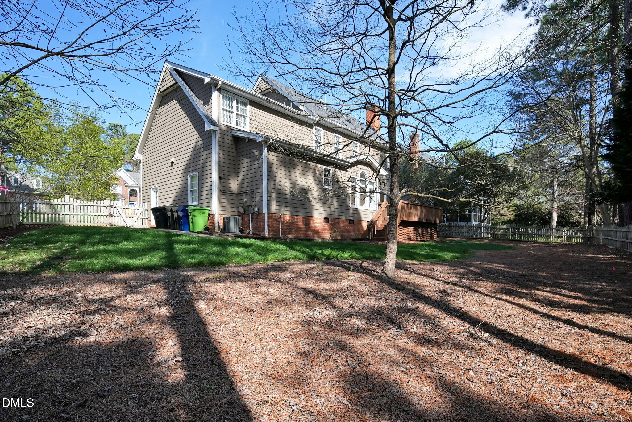 8005 Looking Glass Court Raleigh, NC 27612 - Photo 64 of 75 a view of a house with a yard