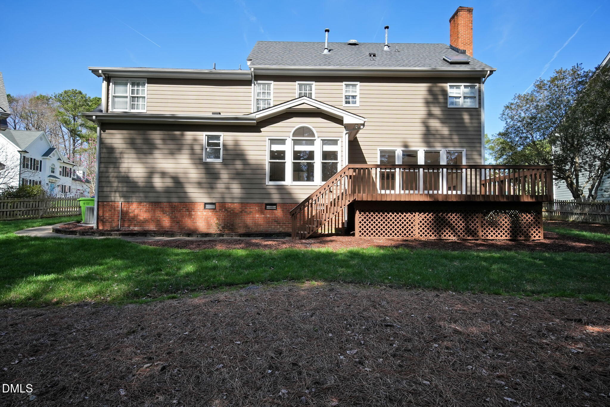 8005 Looking Glass Court Raleigh, NC 27612 - Photo 65 of 75 a front view of a house with garden