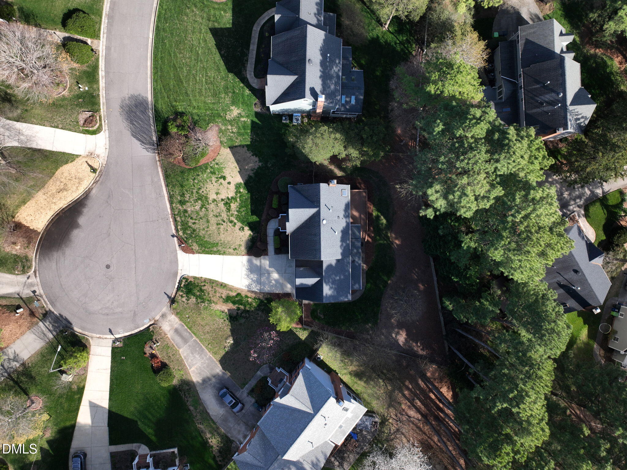 8005 Looking Glass Court Raleigh, NC 27612 - Photo 68 of 75 an aerial view of house with yard swimming pool and outdoor seating
