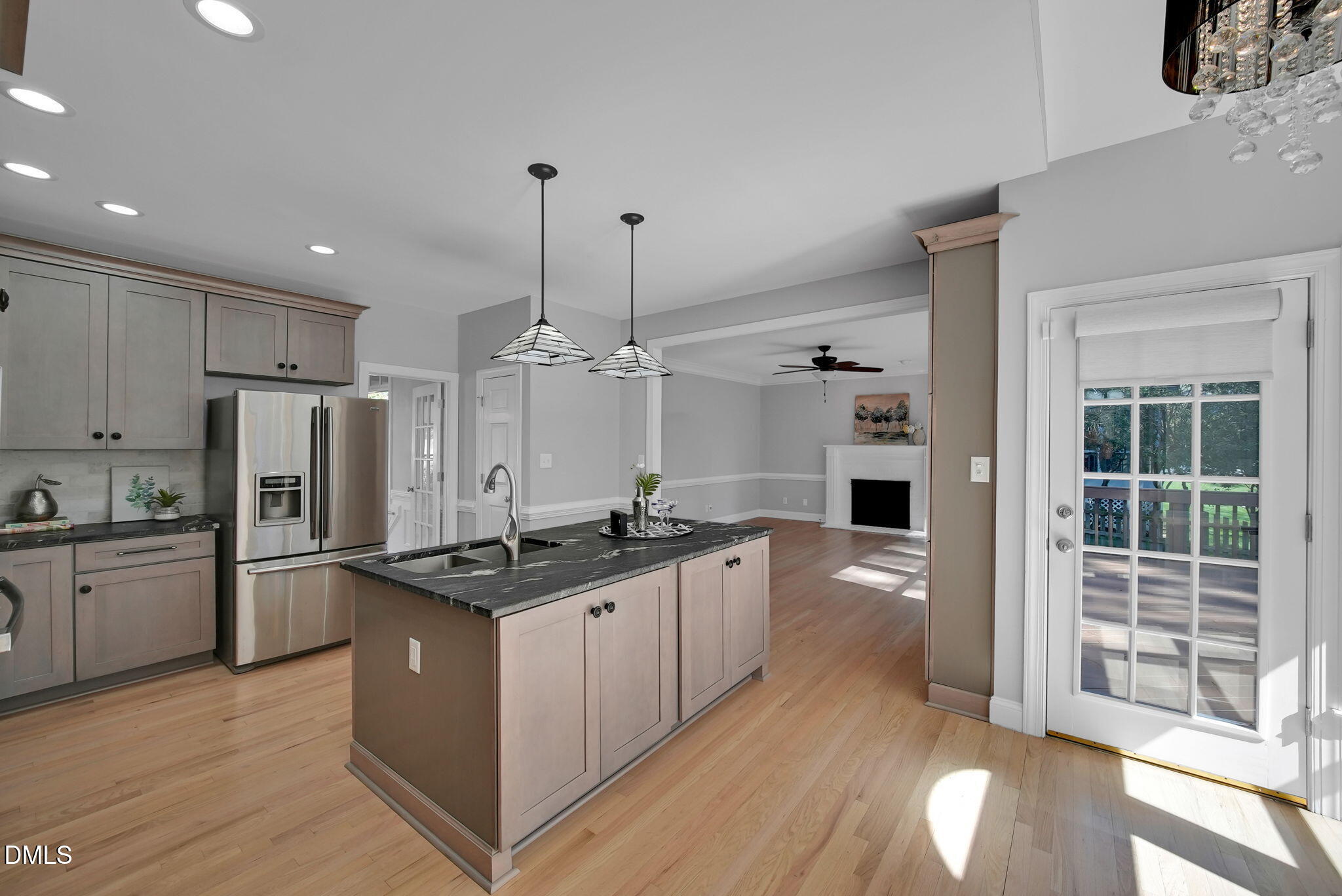8005 Looking Glass Court Raleigh, NC 27612 - Photo 8 of 75 a kitchen with stainless steel appliances granite countertop a stove and a refrigerator
