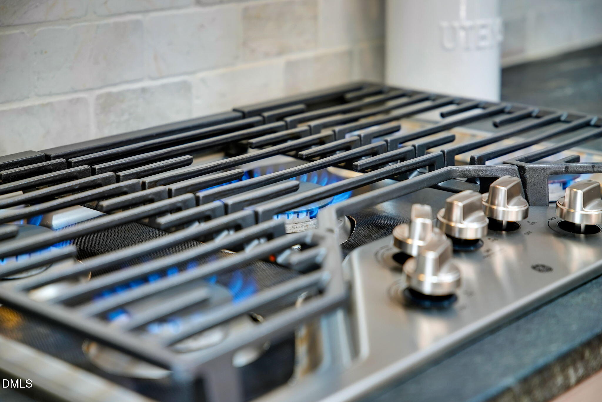 8005 Looking Glass Court Raleigh, NC 27612 - Photo 9 of 75 a close up of a stove top oven