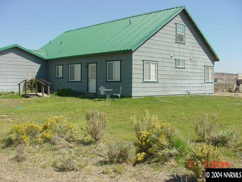 1357 Antelope Valley Road Reno, NV 89506 - Photo 1 of 1 a view of a house with a yard