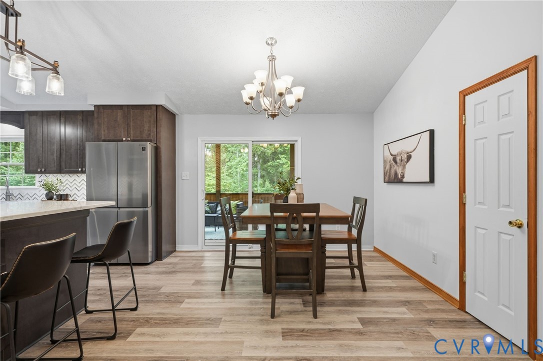 2231 Red Lane Road Powhatan, VA 23139 - Photo 6 of 36 Open-concept dining area is perfect for gathering