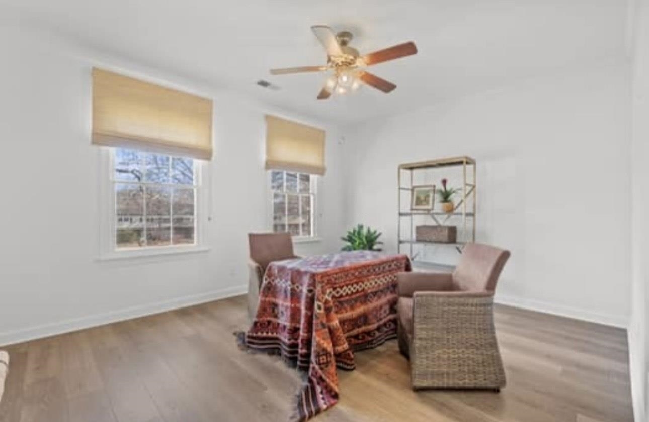 1687 Kimbrough Road, Unit 1687 Germantown, TN 38138 - Photo 12 of 19 Dining room featuring wood finished floors and a ceiling fan
