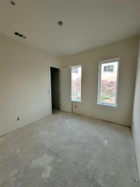 2247 Mail Avenue Dallas, TX 75235 - Photo 22 of 26 a view of an empty room with windows
