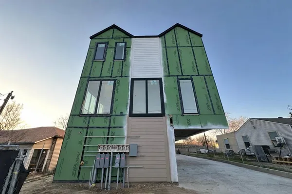 a view of a car park in front of building