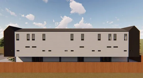 a view of balcony with furniture