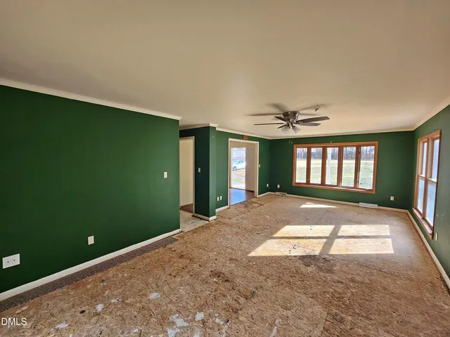 a kitchen with stainless steel appliances granite countertop a stove a refrigerator and a sink