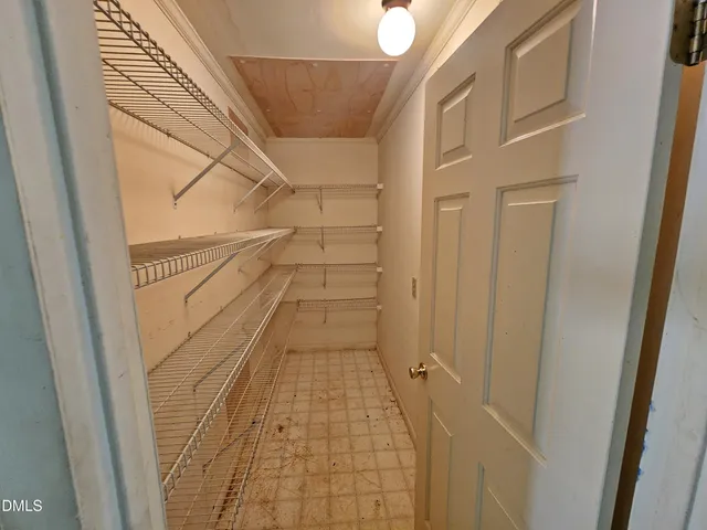 a kitchen with a stove a sink and a refrigerator