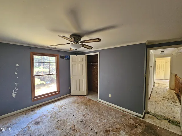 a bathroom with a glass shower door and a sink