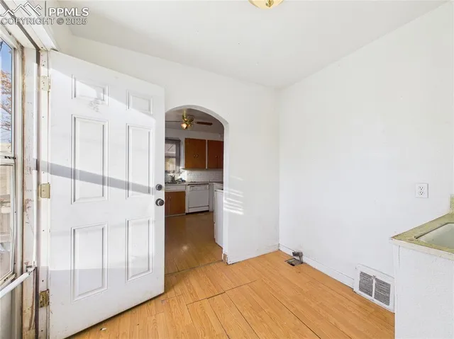 a view of a kitchen with a sink