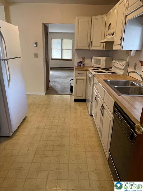 51 South Church Street Nazareth, PA 18064 - Photo 3 of 26 a kitchen with a sink a stove and refrigerator