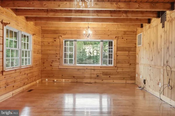 a view of an empty room with stairs