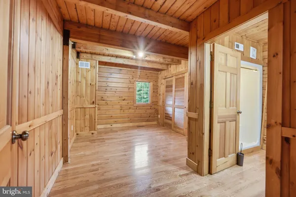 a view of front door of house with stairs