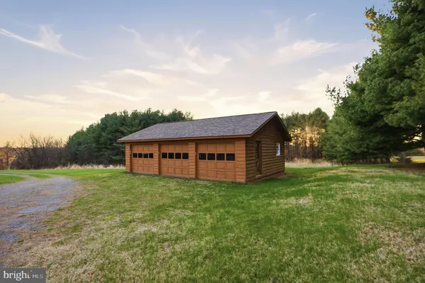 a view of a room with wooden walls