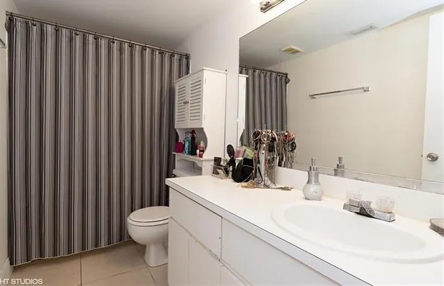 a bathroom with a sink and a toilet