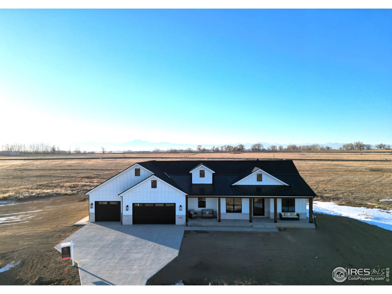 a front view of a house with a ocean view