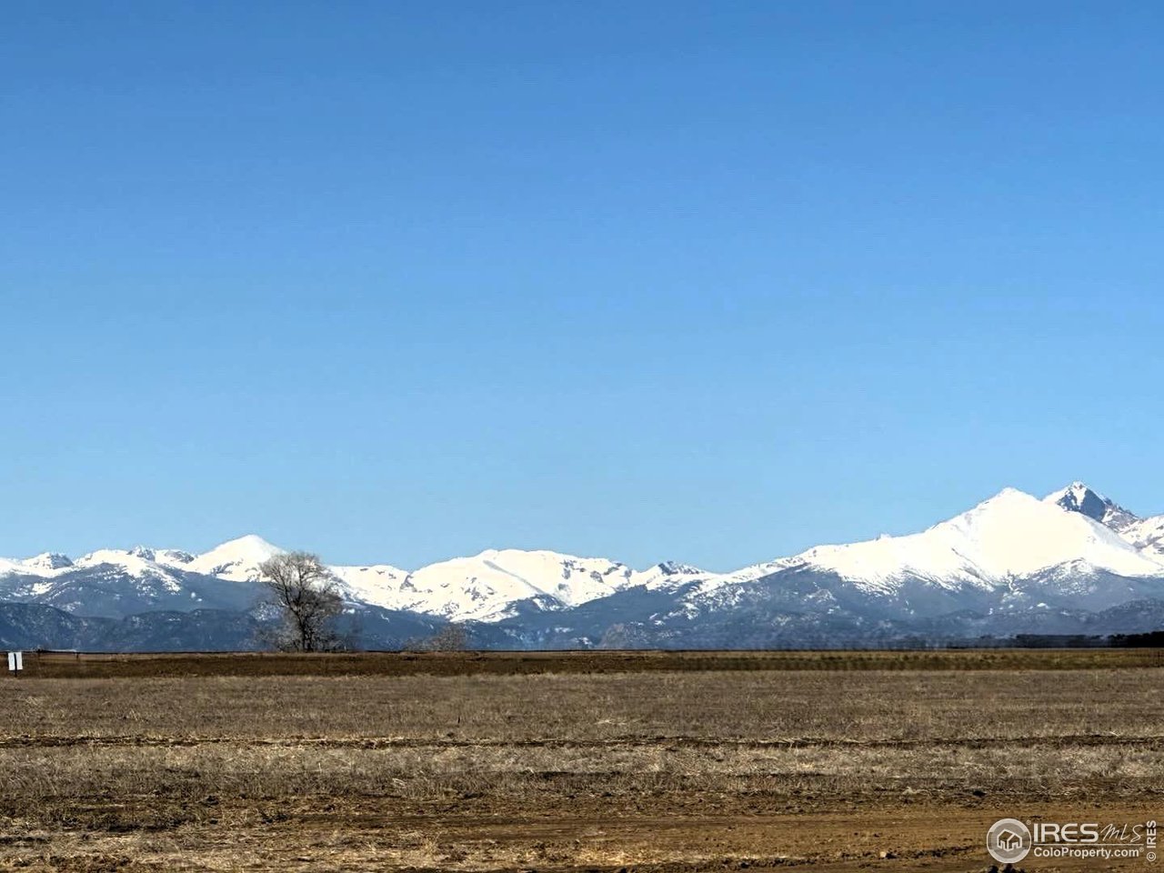 15276 Ypsilon Circle Mead, CO 80542 - Photo 3 of 40 a view of lake and mountain