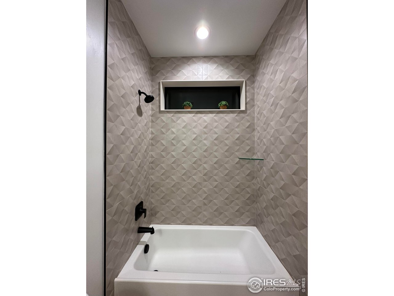 15276 Ypsilon Circle Mead, CO 80542 - Photo 31 of 40 a bathroom with a sink