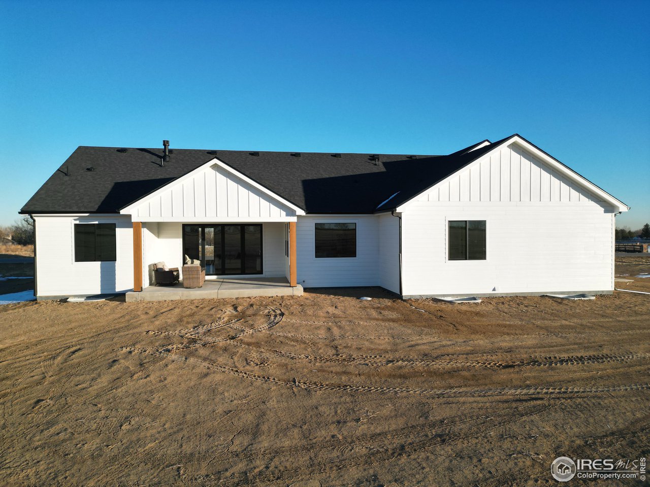 15276 Ypsilon Circle Mead, CO 80542 - Photo 39 of 40 a front view of a house with a yard