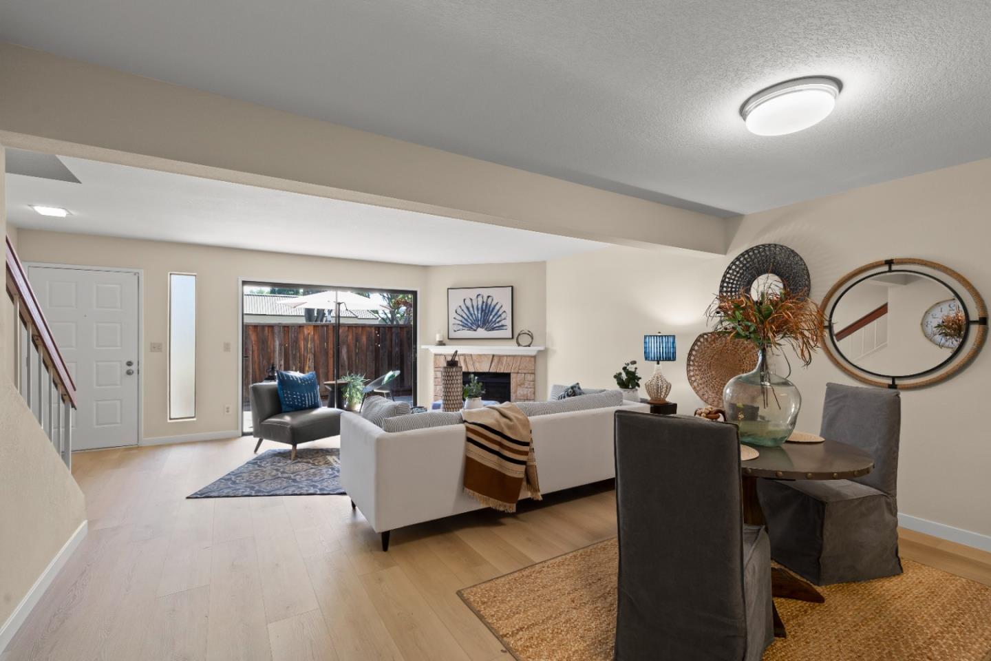 754 Gettysburg Way Gilroy, CA 95020 - Photo 12 of 56 a living room with fireplace furniture and a wooden floor