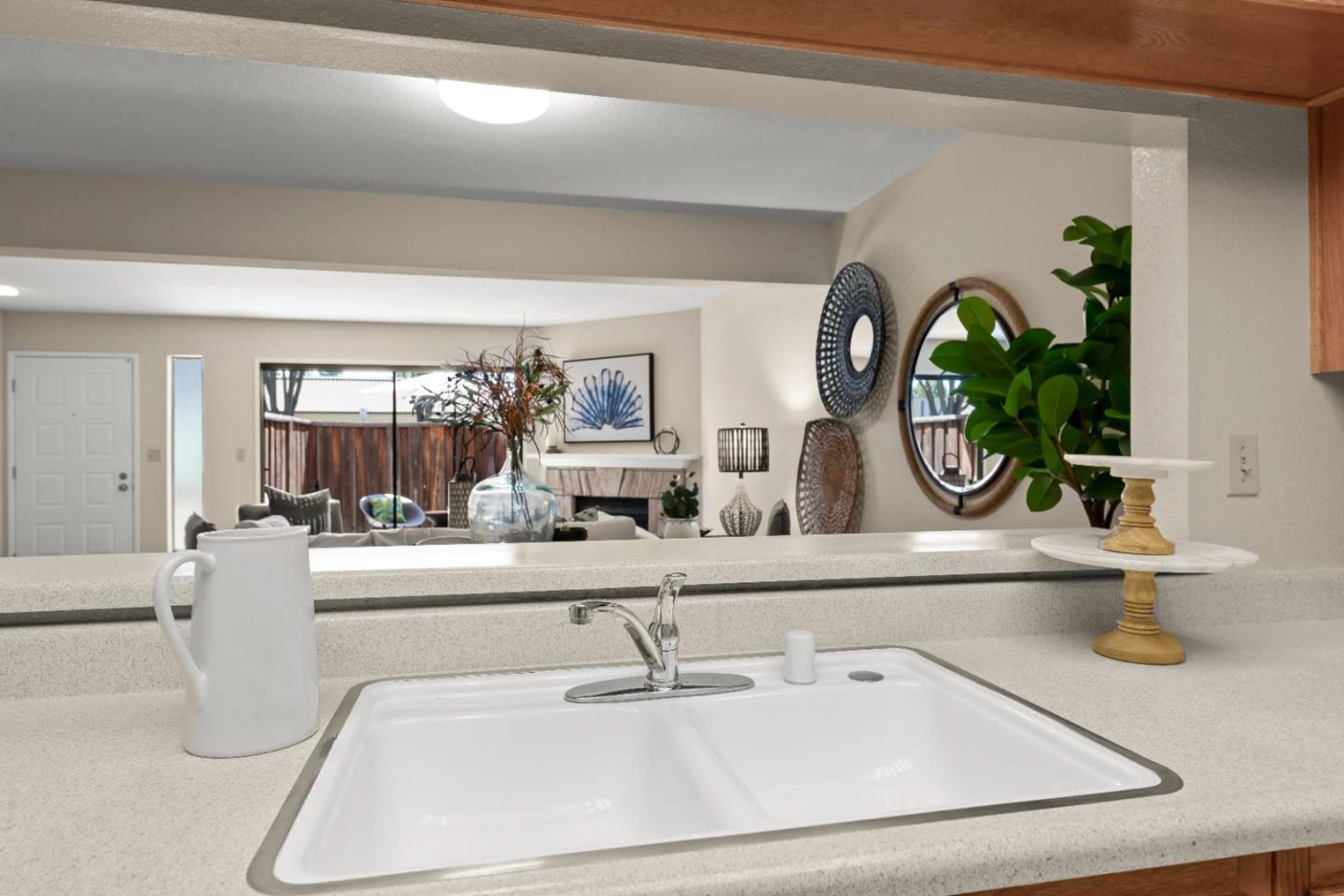 754 Gettysburg Way Gilroy, CA 95020 - Photo 19 of 56 a living room with furniture and a mirror