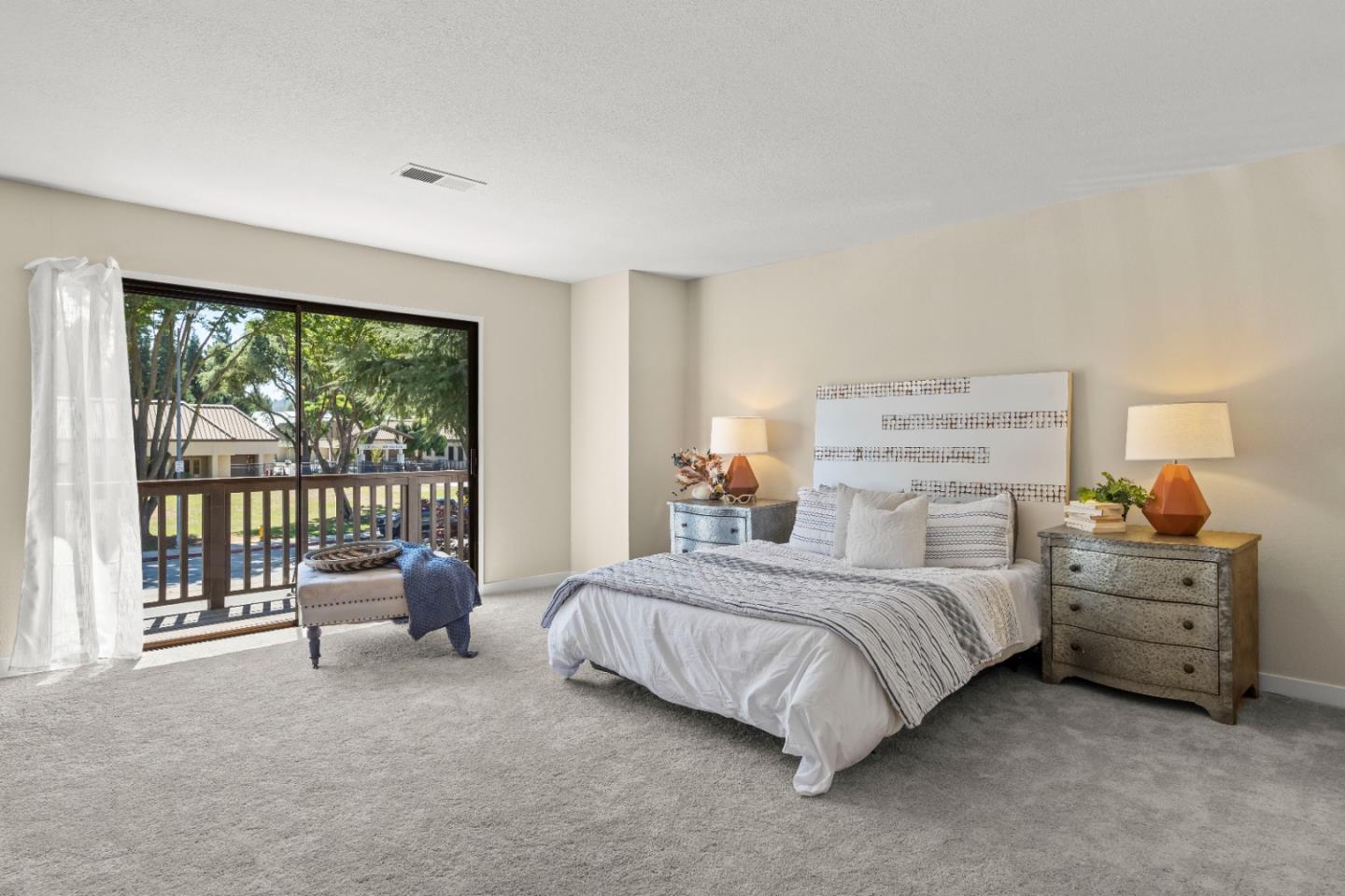 754 Gettysburg Way Gilroy, CA 95020 - Photo 21 of 56 a bedroom with a bed and large windows