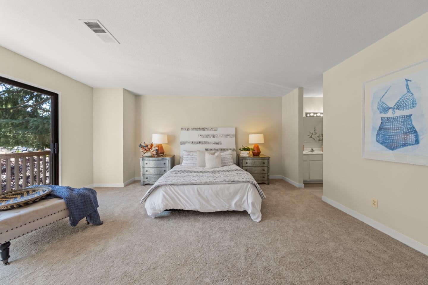 754 Gettysburg Way Gilroy, CA 95020 - Photo 22 of 56 a spacious bedroom with a bed and a couch