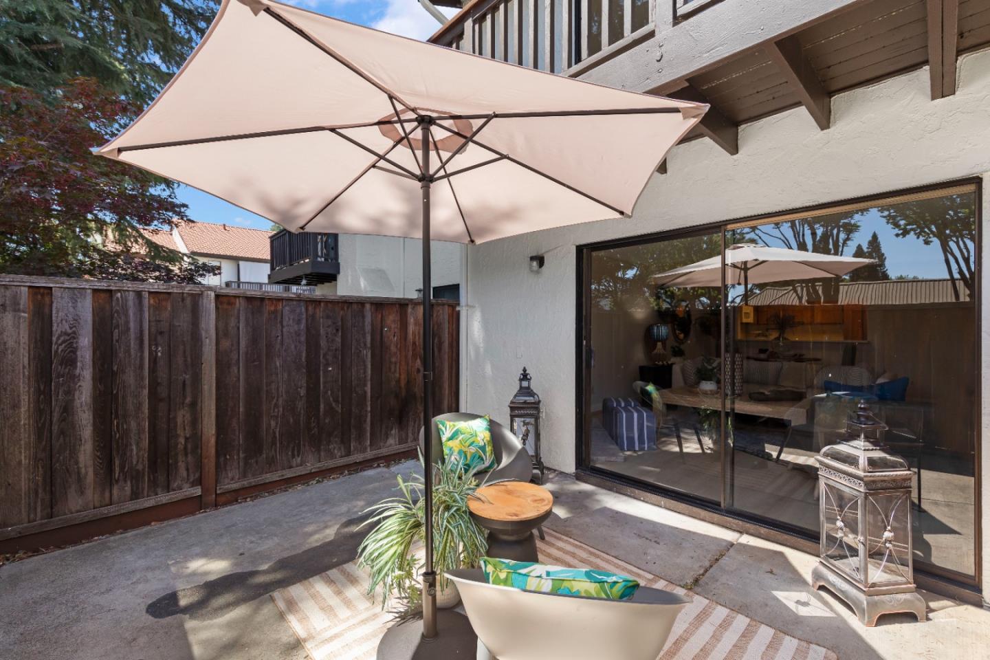 754 Gettysburg Way Gilroy, CA 95020 - Photo 43 of 56 a view of a chairs and table in backyard