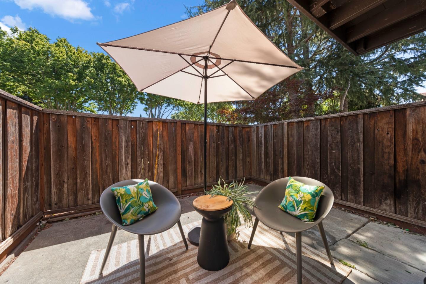754 Gettysburg Way Gilroy, CA 95020 - Photo 45 of 56 a view of a two chairs in patio with wooden fence