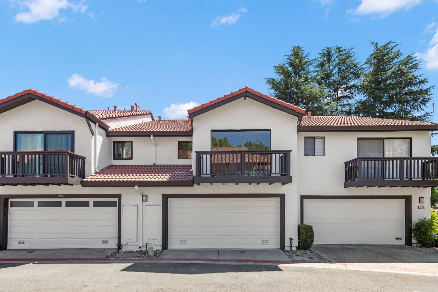 754 Gettysburg Way Gilroy, CA 95020 - Photo 47 of 56 a front view of a house with a garage
