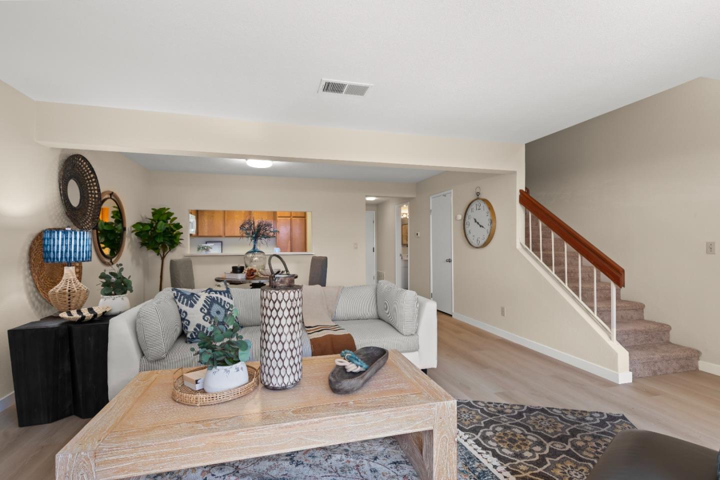754 Gettysburg Way Gilroy, CA 95020 - Photo 8 of 56 a living room with furniture and wooden floor