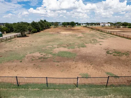 a view of a terrace with a yard