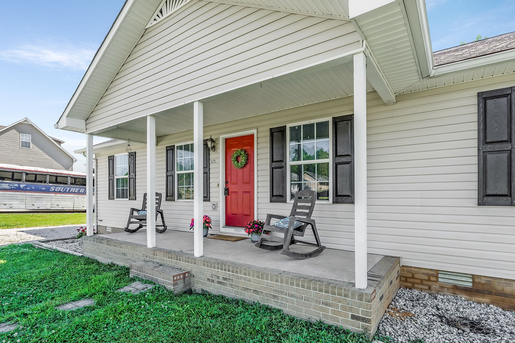 6215 Cheyenne Trail Baxter, TN 38544 - Photo 2 of 27 a view of a house with backyard and porch