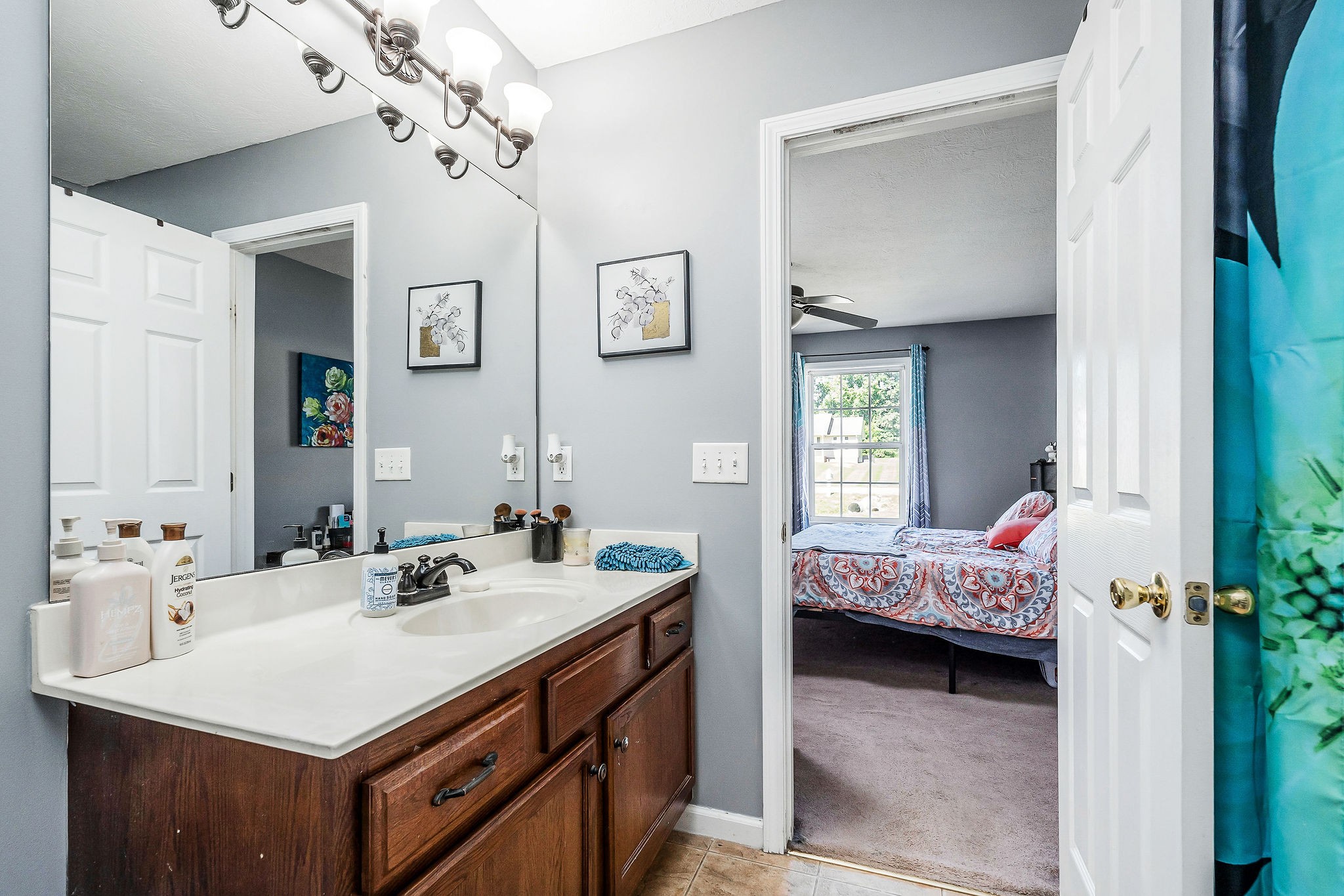 6215 Cheyenne Trail Baxter, TN 38544 - Photo 21 of 27 a en suite bathroom with a sink double vanity and a mirror