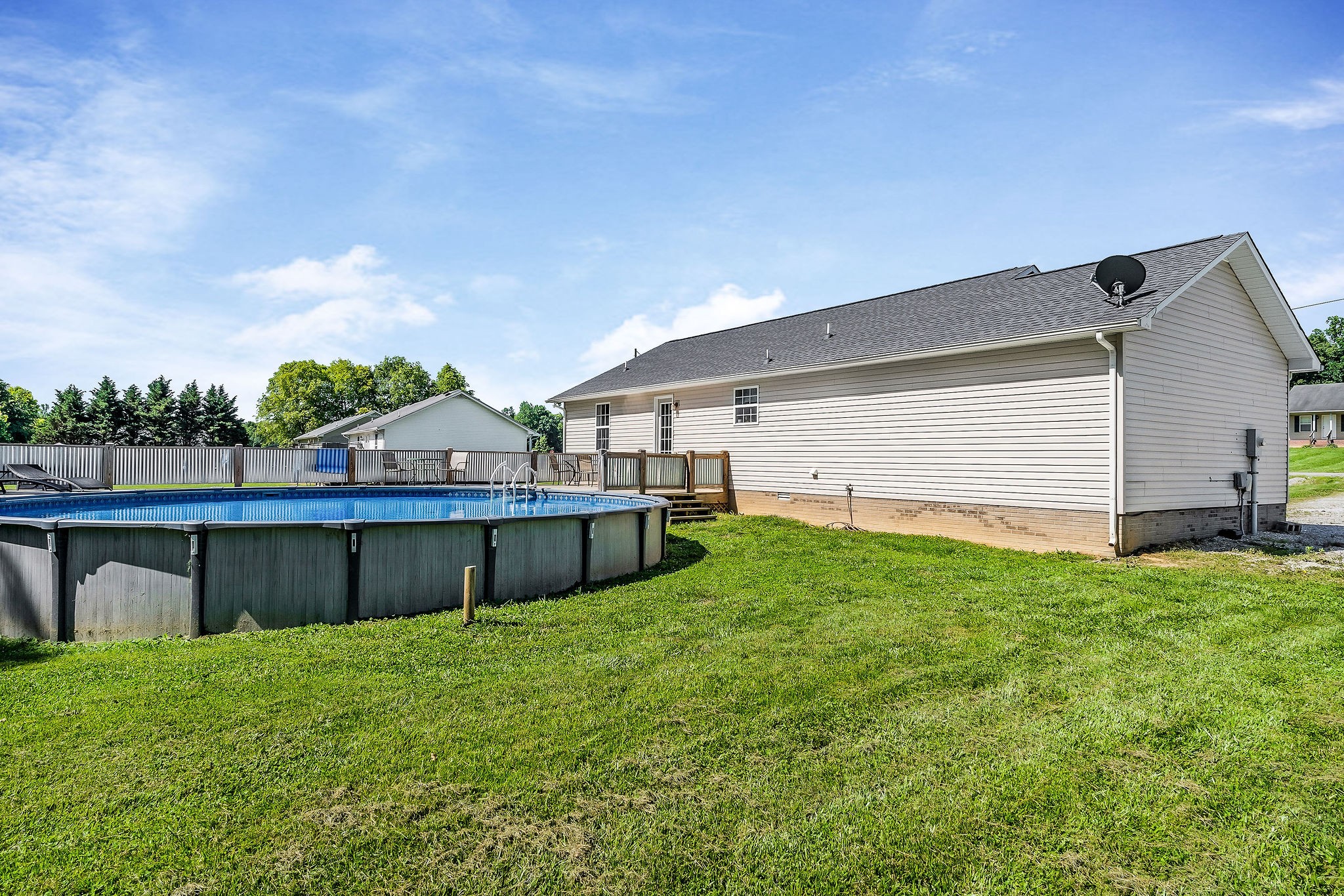 6215 Cheyenne Trail Baxter, TN 38544 - Photo 26 of 27 a view of a backyard with a garden and entertaining space