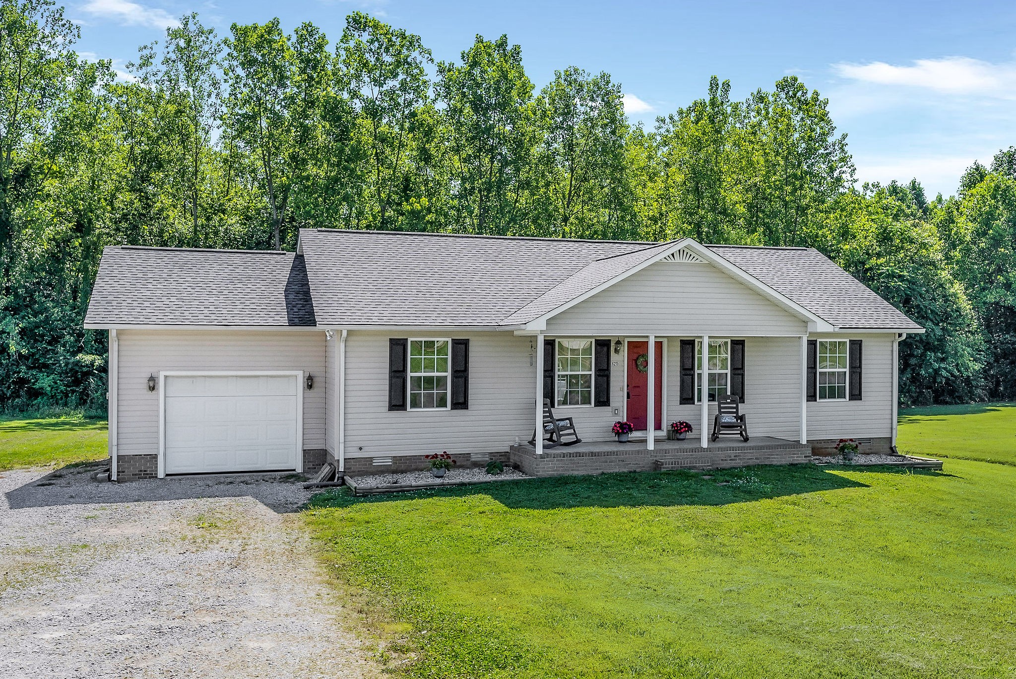6215 Cheyenne Trail Baxter, TN 38544 - Photo 3 of 27 a front view of house with yard and seating area