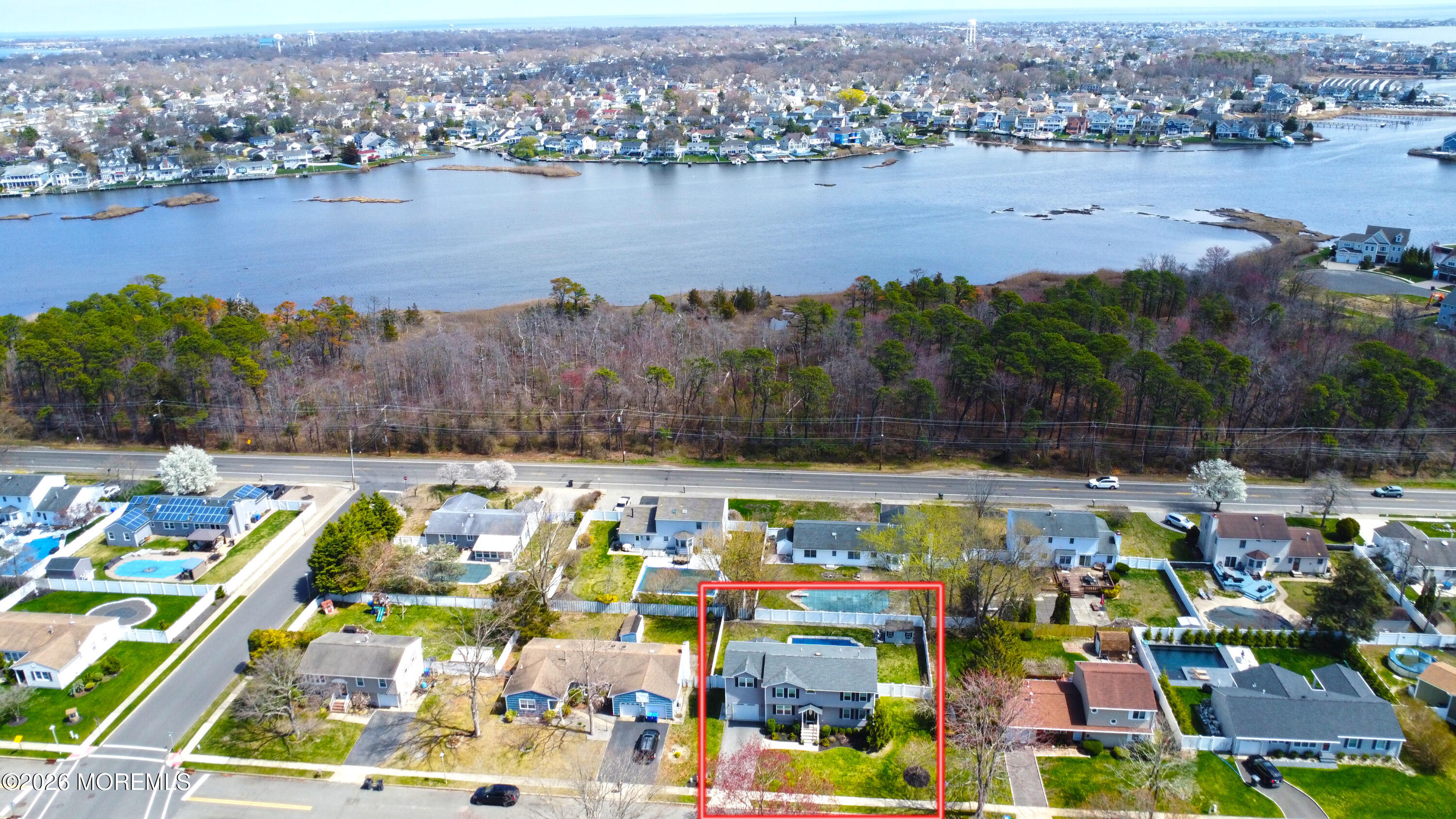 149 Berkeley Drive Brick, NJ 08724 - Photo 33 of 35 an aerial view of residential houses with outdoor space and lake view