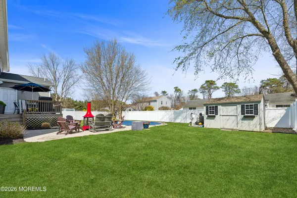 a view of a house with a back yard