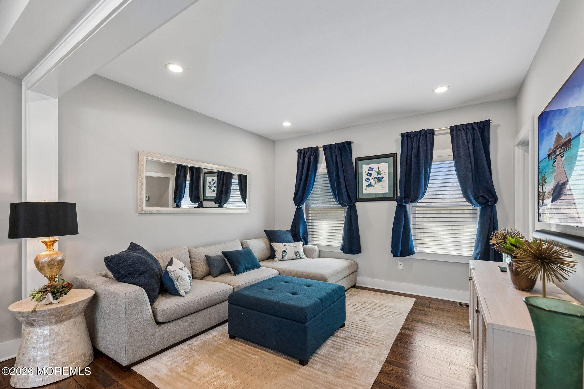 149 Berkeley Drive Brick, NJ 08724 - Photo 7 of 35 a living room with furniture and wooden floor