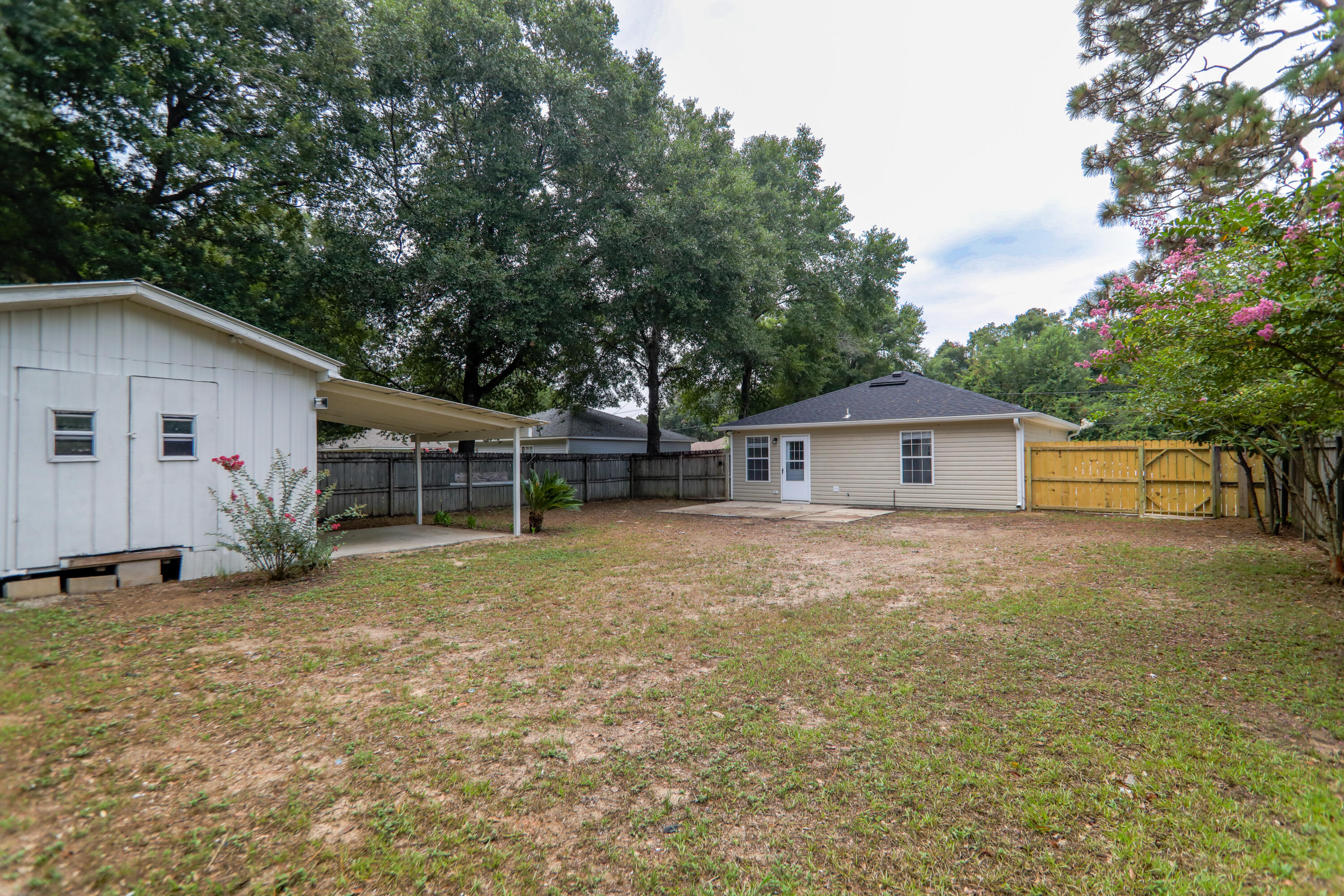 159 Patch Avenue Crestview, FL 32539 - Photo 9 of 11 a view of a house with a yard