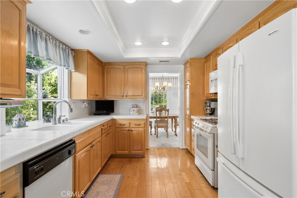 19562 Shadow Springs Way Porter Ranch, CA 91326 - Photo 16 of 57 Kitchen Looking into Dining Area