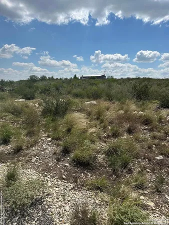 a view of a lake with mountains in the background